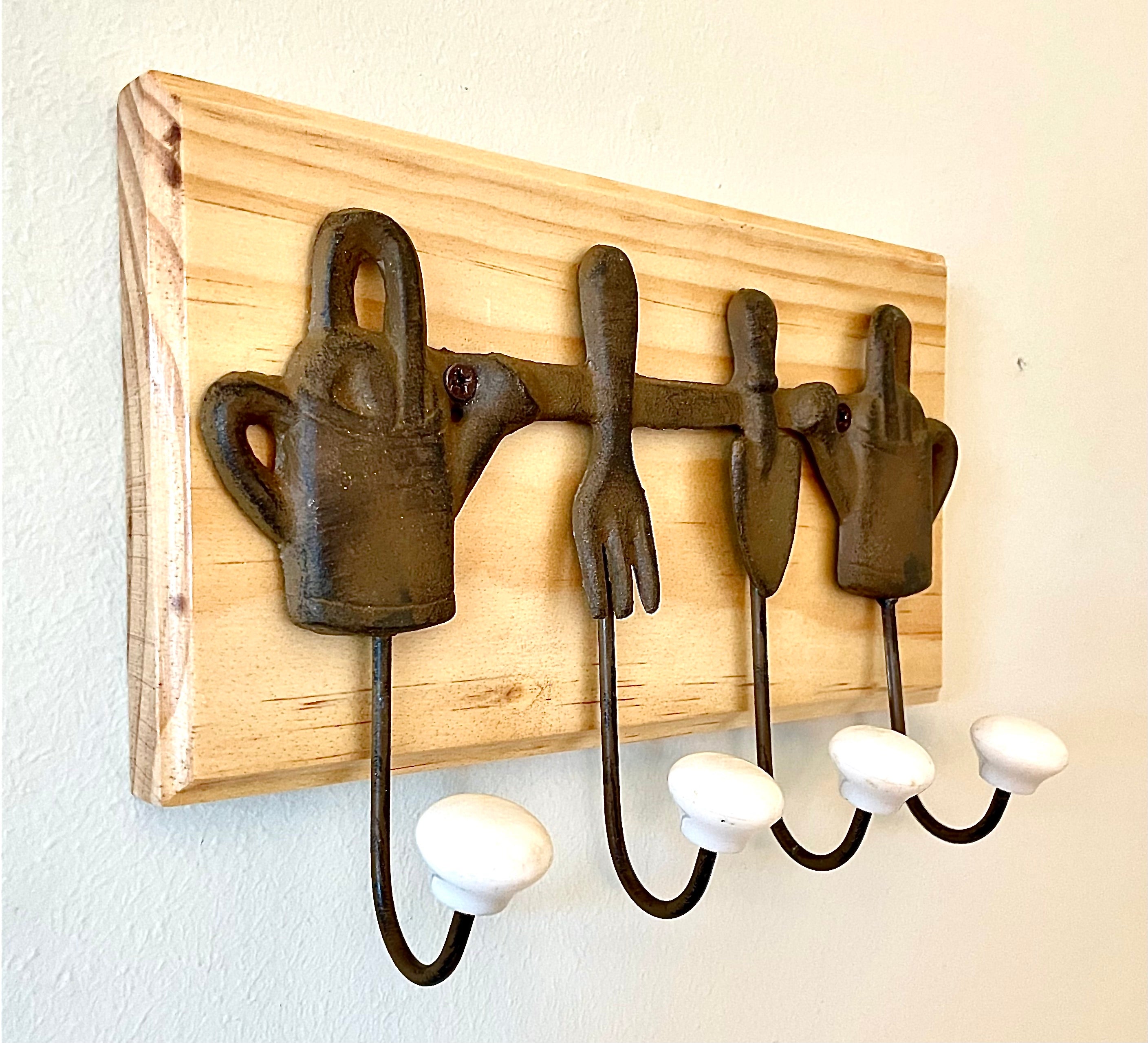 Vintage Cast Iron Gardening Tool Rack Mounted on Handcrafted Wood
